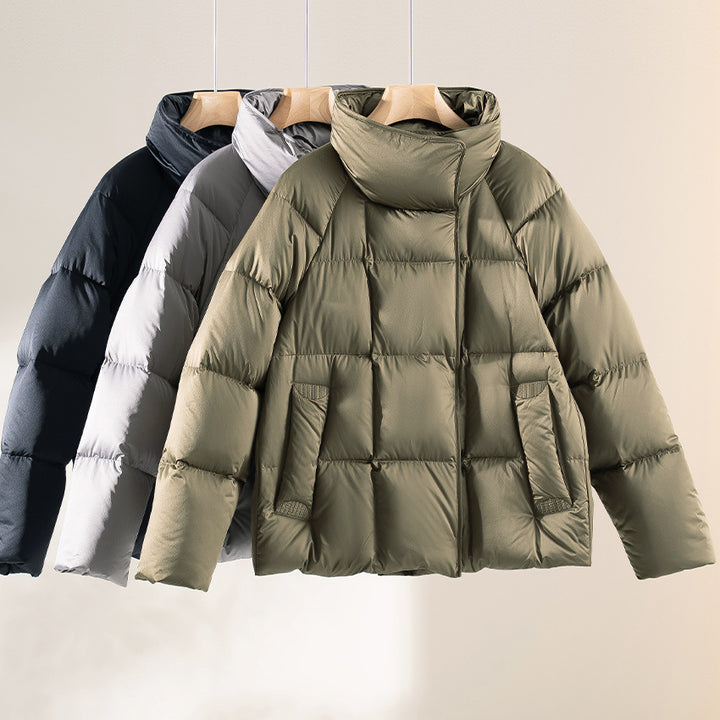 Damen Kurze Boxy-Pufferjacke mit hohem Stehkragen und Raglanärmeln Echoarchiv