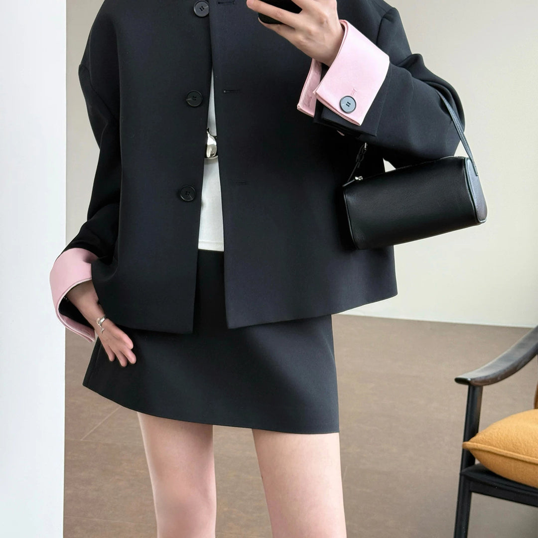 Damen Modische und elegante Jacke mit kontrastierenden Ärmeln Echoarchiv