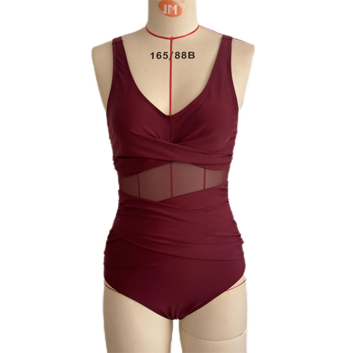 Damen Einteiler Badeanzug mit raffiniertem Wickeldesign und elastischen Einsätzen Echo Archiv