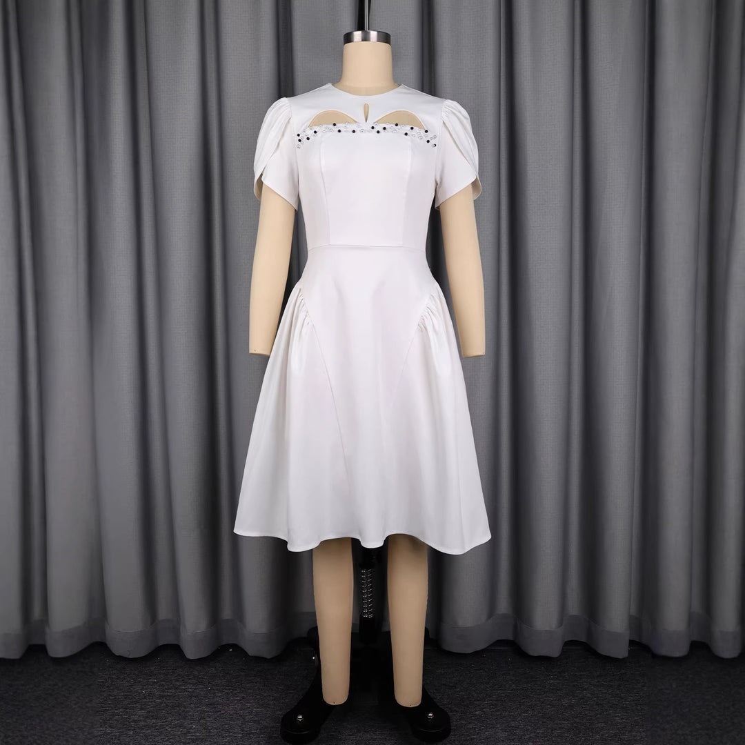 Damen Abendkleid mit voluminösen Puffärmeln und raffinierten Cut-Outs Echo Archiv
