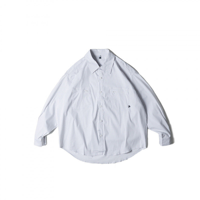 Unisex Oversize-kariertes Hemd mit rundem Saum und aufgesetzten Brusttaschen Echo Archiv