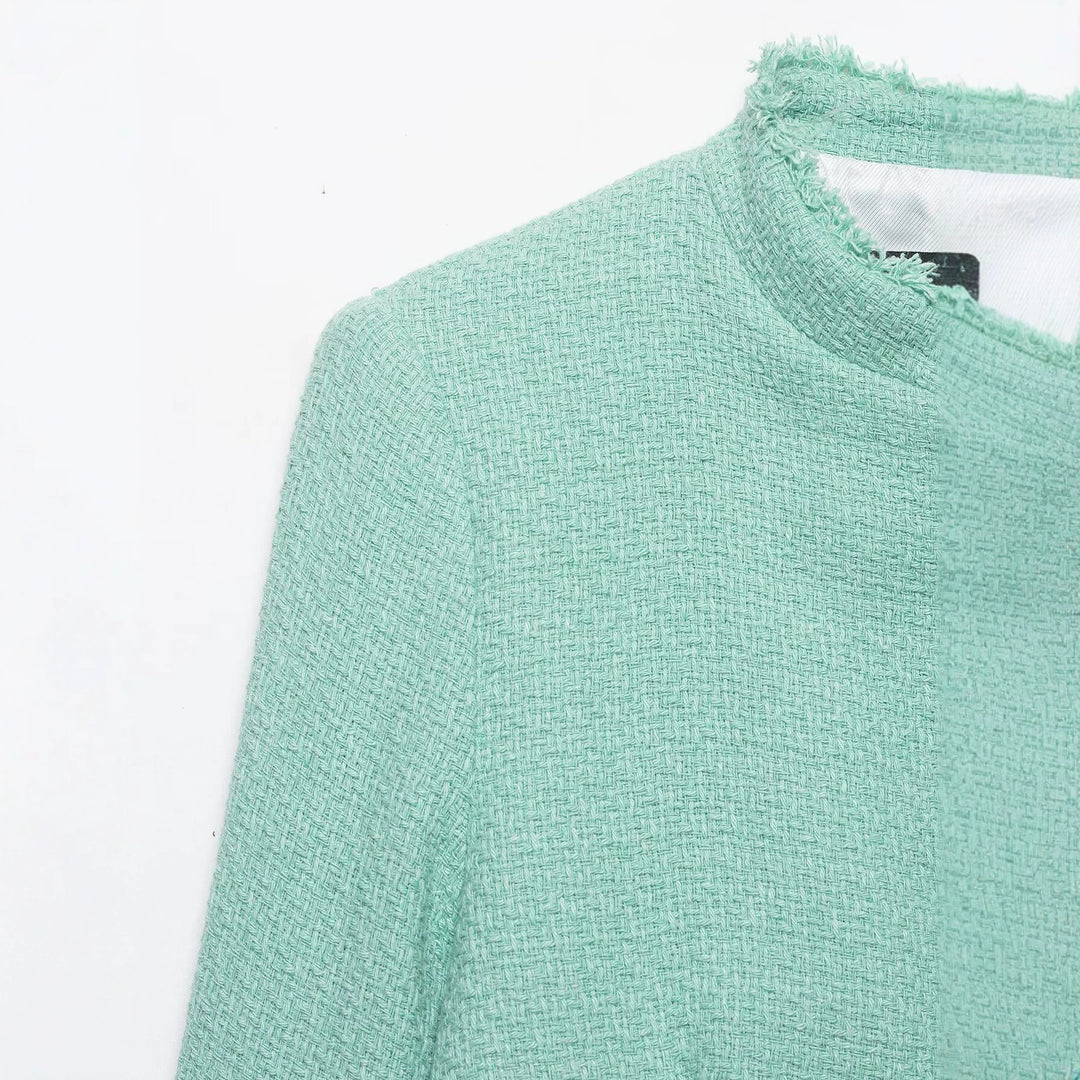 Damen Kurz geschnittene Bouclé-Tweedjacke mit Fransenbesatz und asymmetrischer Knopfleiste Echo Archiv