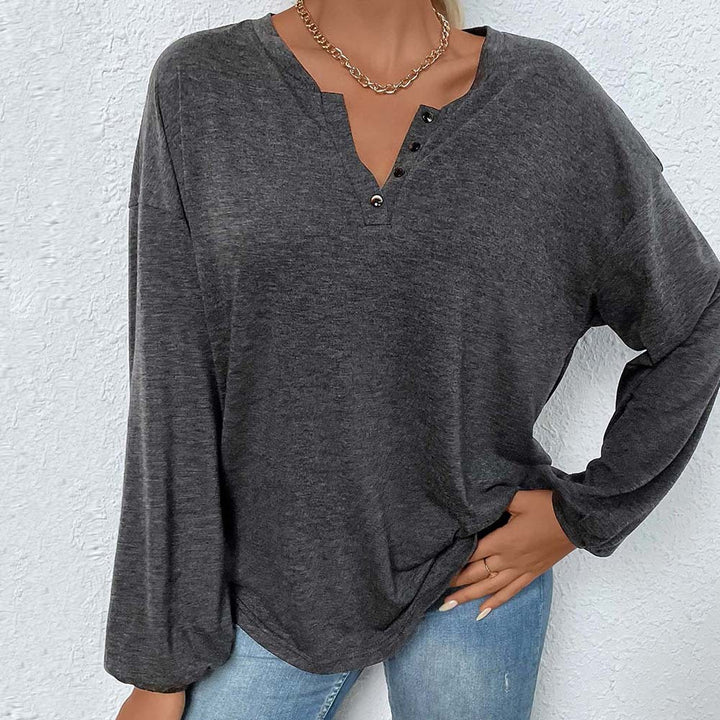 Damen lässiges Oversize-Henley-Longsleeve mit V-Knopfleiste und Ballonärmeln – Avérine