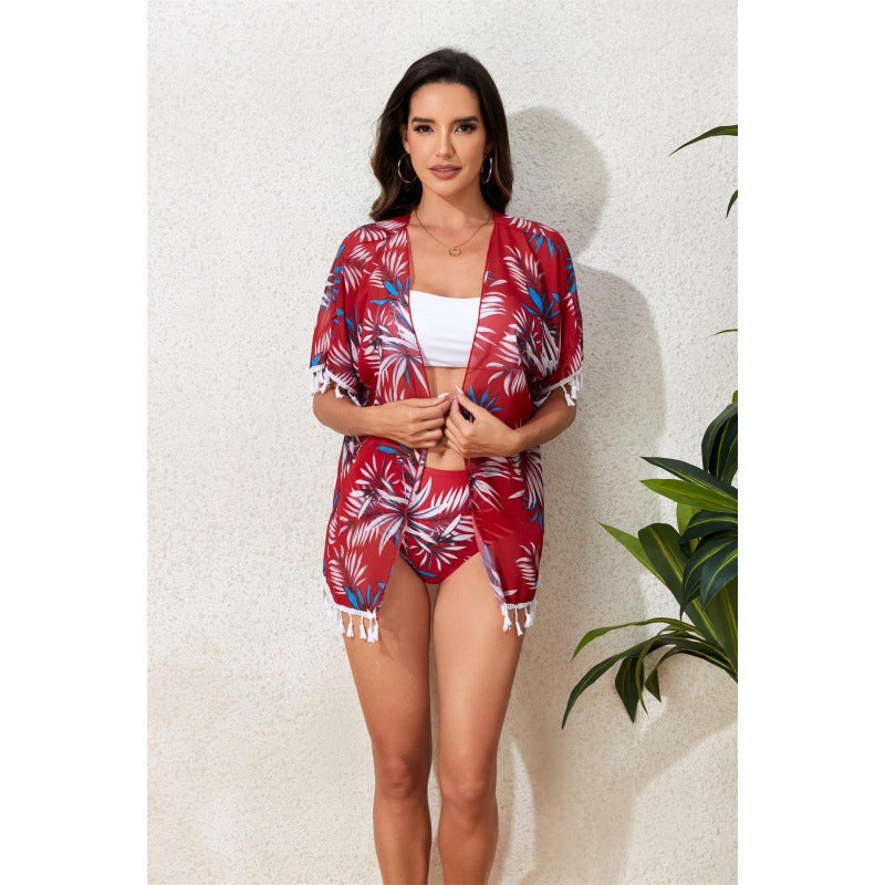 Damen Strandkleid mit floralem Design und fransenverziertem Überwurf Echo Archiv