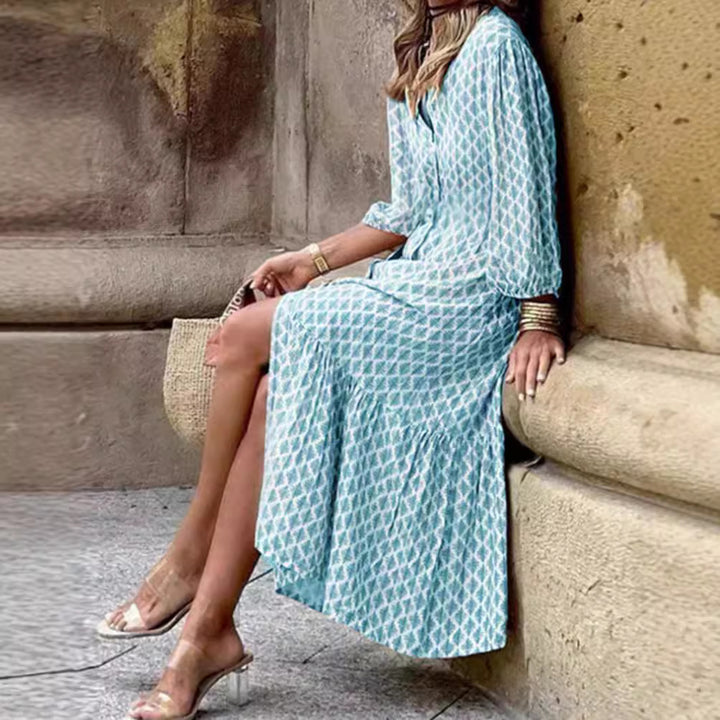Damen nan leichtes gemustertes Midikleid mit V-Ausschnitt, Knopfleiste, Stufenrock und Ballonärmeln Echo Archiv