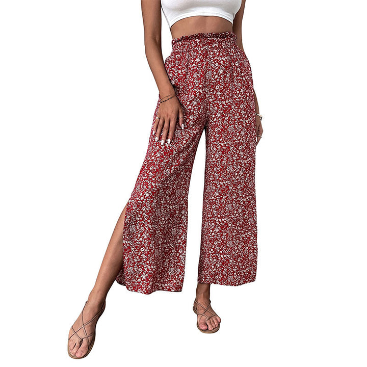 Damen Weite hochgeschnittene Palazzo‑Hose mit floralem Muster und seitlichem Beinschlitz Echoarchiv