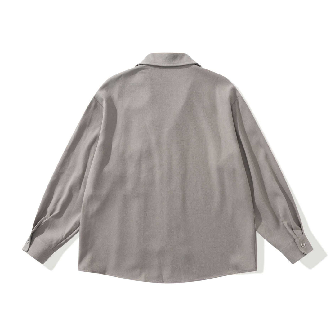 Unisex Oversize Hemdjacke mit offenem Reverskragen und Brusttasche Echoarchiv
