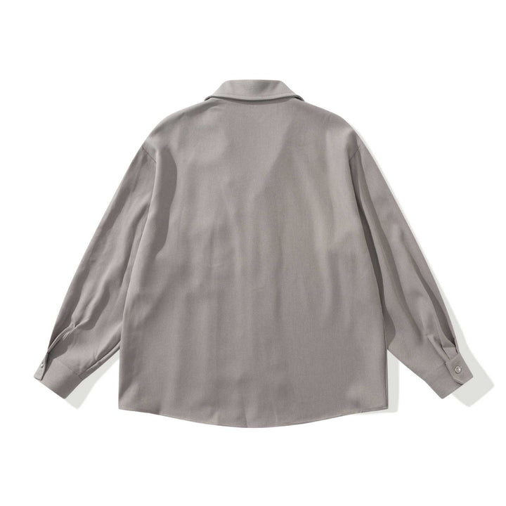 Unisex Oversize Hemdjacke mit offenem Reverskragen und Brusttasche Echoarchiv