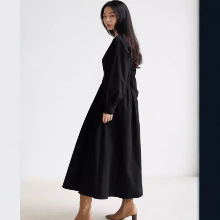 Damen Maxikleid mit Taillenabnähern, Rundhalsausschnitt und voluminösen Manschetten Echoarchiv