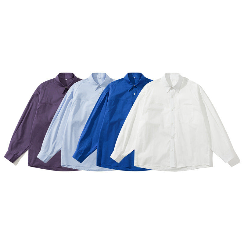 Unisex Leichtes Oversize-Hemd im Boxy-Cut mit Brusttasche und abgerundetem Saum Echoarchiv