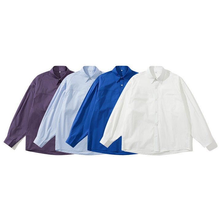 Unisex Leichtes Oversize-Hemd im Boxy-Cut mit Brusttasche und abgerundetem Saum Echoarchiv