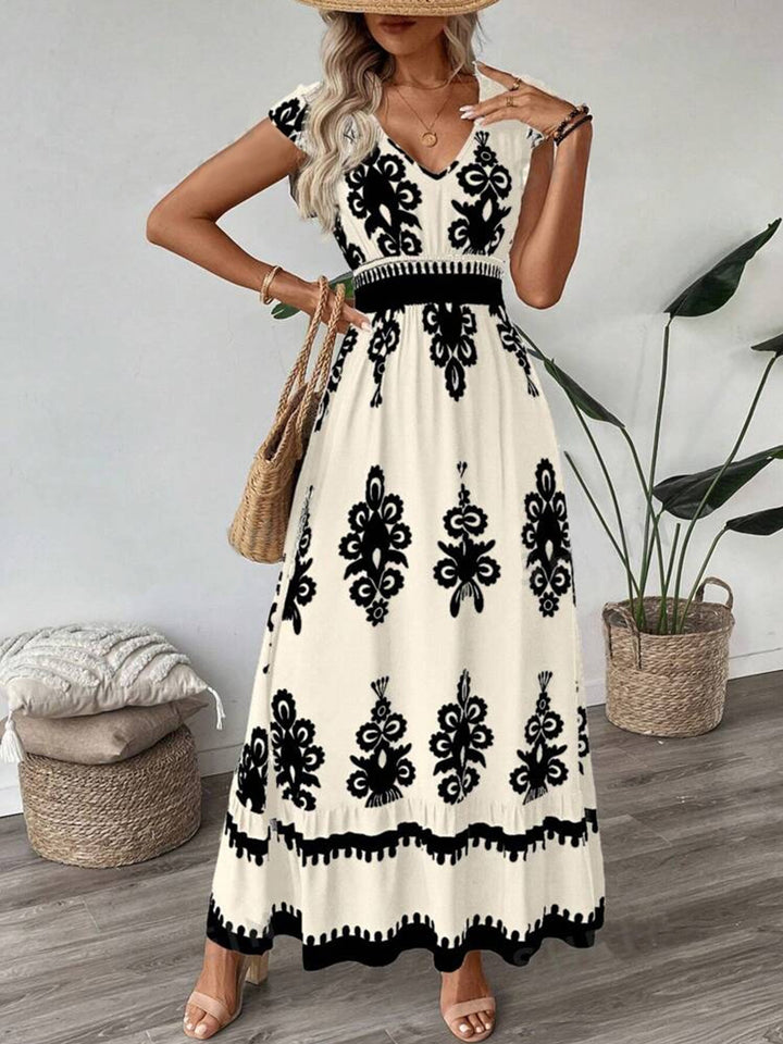 Damen Elegantes Maxikleid mit faszinierendem Musterdruck Echo Archiv