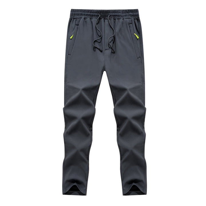 Herren Konisch zulaufende Tech-Jogginghose mit elastischem Bund, Reißverschlusstaschen und atmungsaktivem Funktionsmaterial Echoarchiv