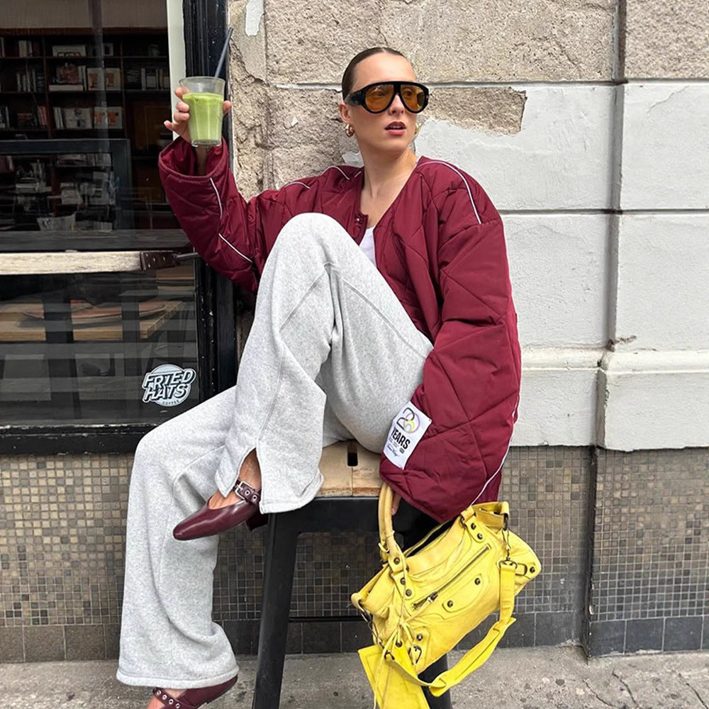 Damen Oversize-Steppjacke mit Diamantstepp, kontrastierender Paspel und Druckknopfverschluss Echoarchiv