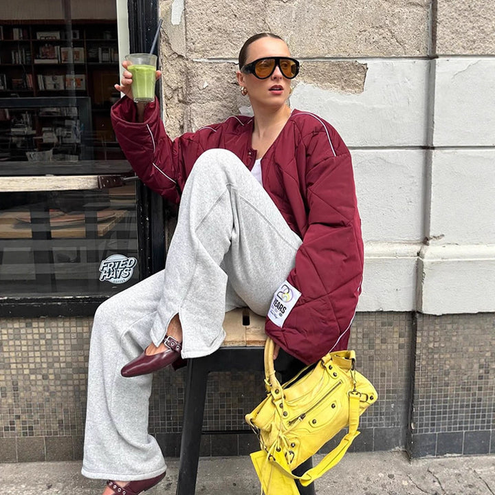 Damen Oversize-Steppjacke mit Diamantstepp, kontrastierender Paspel und Druckknopfverschluss Echoarchiv