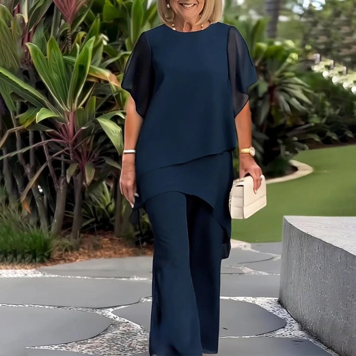 Damen elegantes Ensemble aus fließendem Oberteil und weitem Hose Echoarchiv