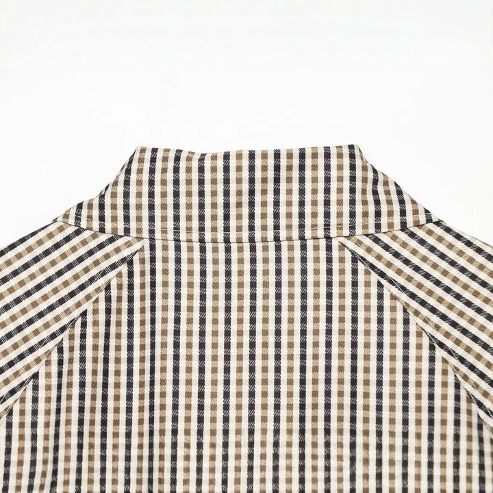 Damen Kurze taillierte Doppelreihige Trenchjacke mit Karo‑Muster und Bindegürtel Echoarchiv