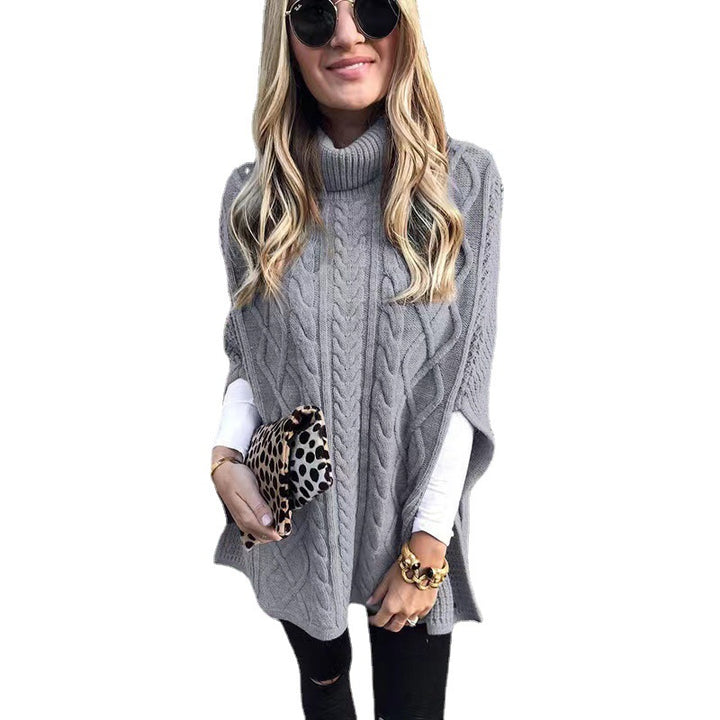 Damen nan kastiger Strickponcho mit hohem Rollkragen, Zopfstruktur und seitlichen Schlitzen Echo Archiv