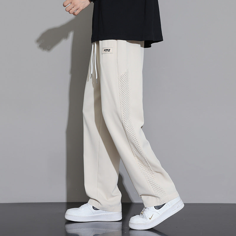 Herren Sportliche Relaxed Fit Jogginghose mit Mesh-Einsätzen