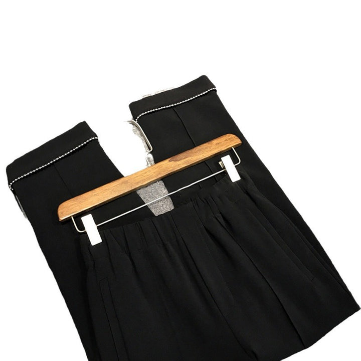 Damen Elegante Chino-Hose mit dekorativen Perlendetails Echoarchiv