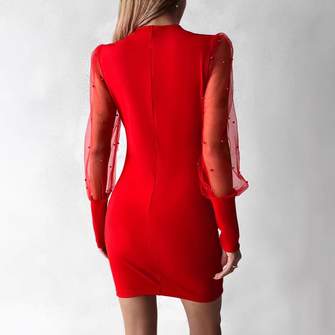 Damen Wickelkleid mit eleganten transparenten Ärmeln und schimmerndem Detail Echo Archiv