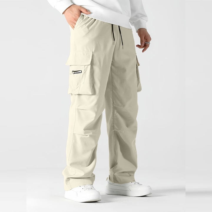 Herren weite Utility-Cargohose mit Tunnelzugbund, Knieabnähern und Multifachtaschen Echo Archiv