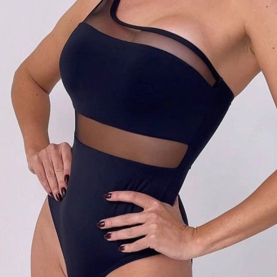 Damen Einteiler Badeanzug mit asymmetrischem Schnitt und transparenten Akzenten Echo Archiv