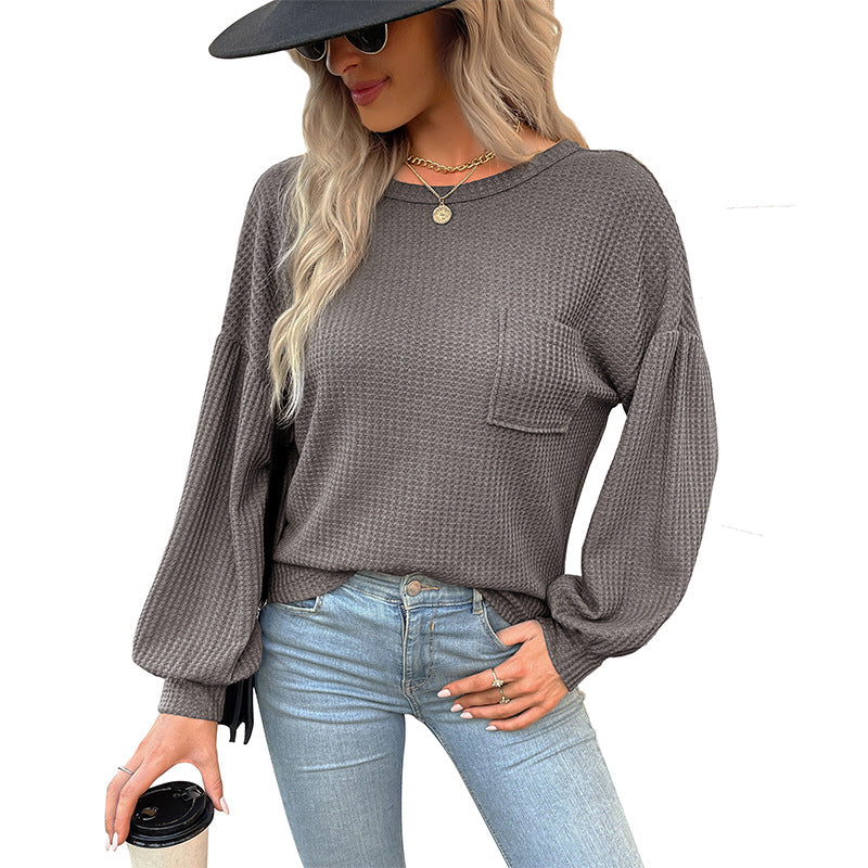 Damen Waffelstrick-Langarmshirt mit Oversize-Brusttasche und Ballonärmeln Echoarchiv