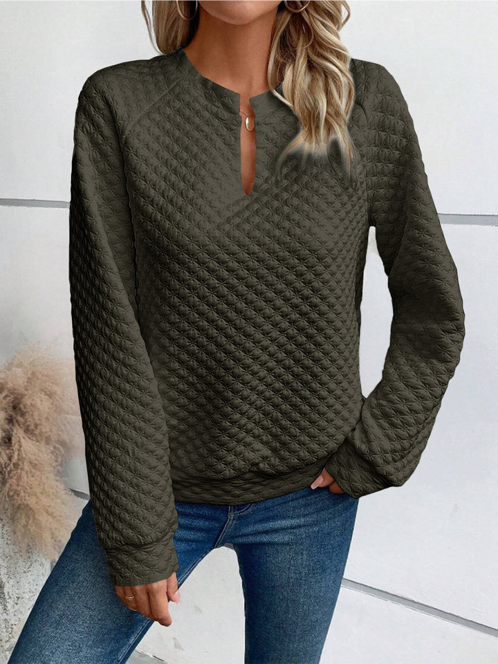 Damen Gestepptes Sweatshirt mit Schlitzkragen, Rautenstruktur und Raglanärmeln – Mavelle