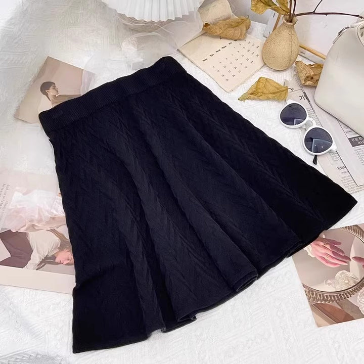 Damen Plissierter Strickrock mit Zopfmuster Echo Archiv