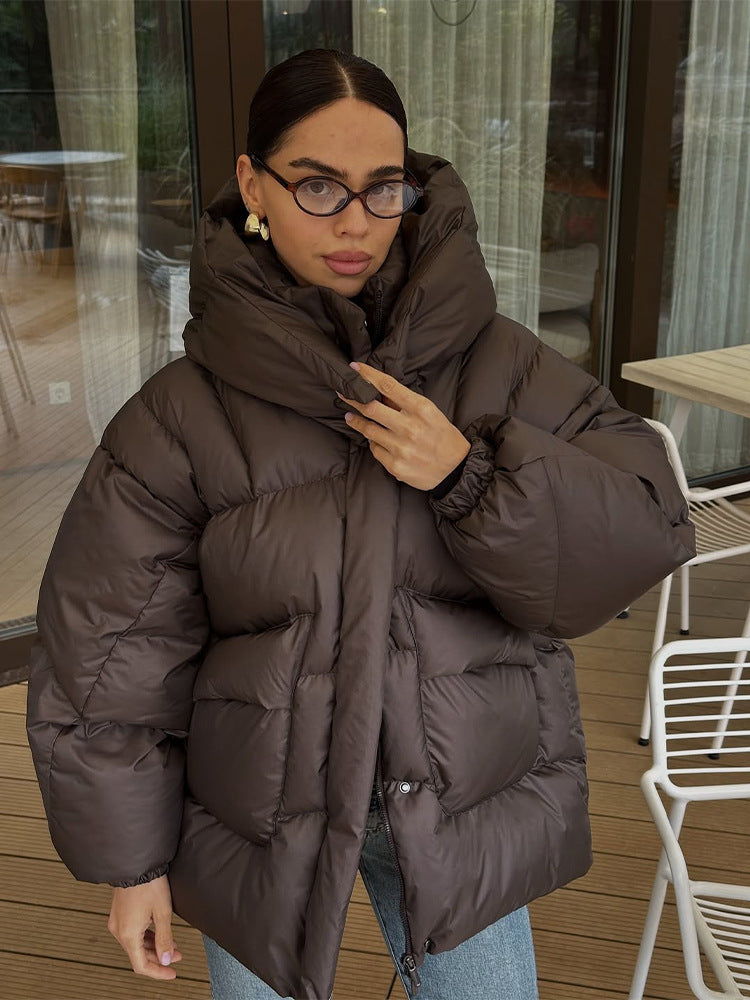 Damen Oversize Steppjacke mit hohem Schalkragen und wattierter Füllung Echoarchiv