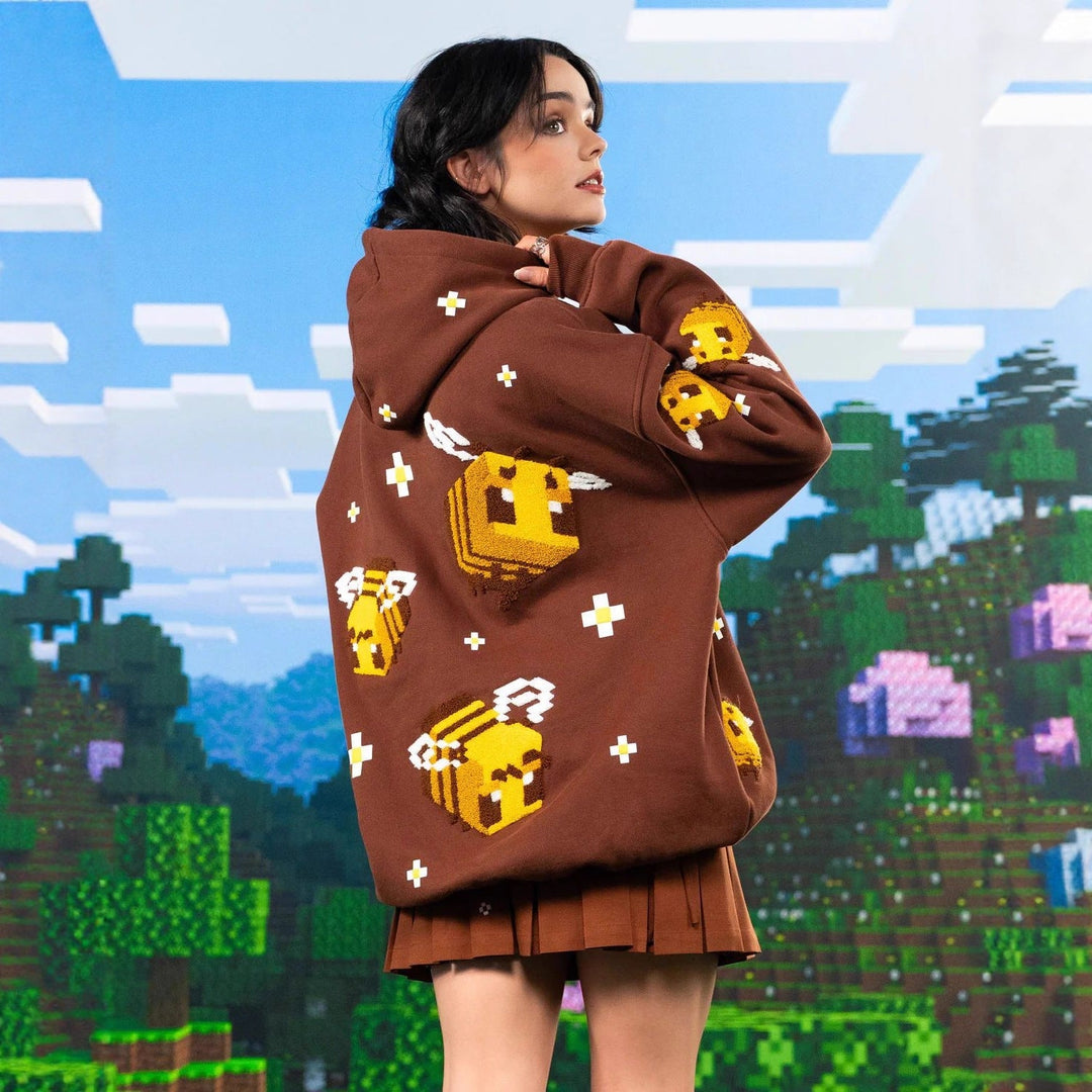 Unisex nan Kapuzenpullover mit eingestricktem Pixel-Bienenmotiv und aufgesetzter Kängurutasche Echoarchiv