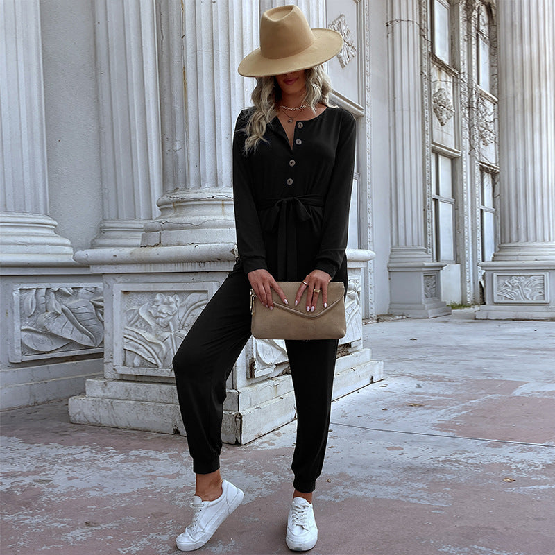 Damen Lässiger Einteiler-Jumpsuit mit Knopfleiste, Bindegürtel und Rippbündchen Echoarchiv