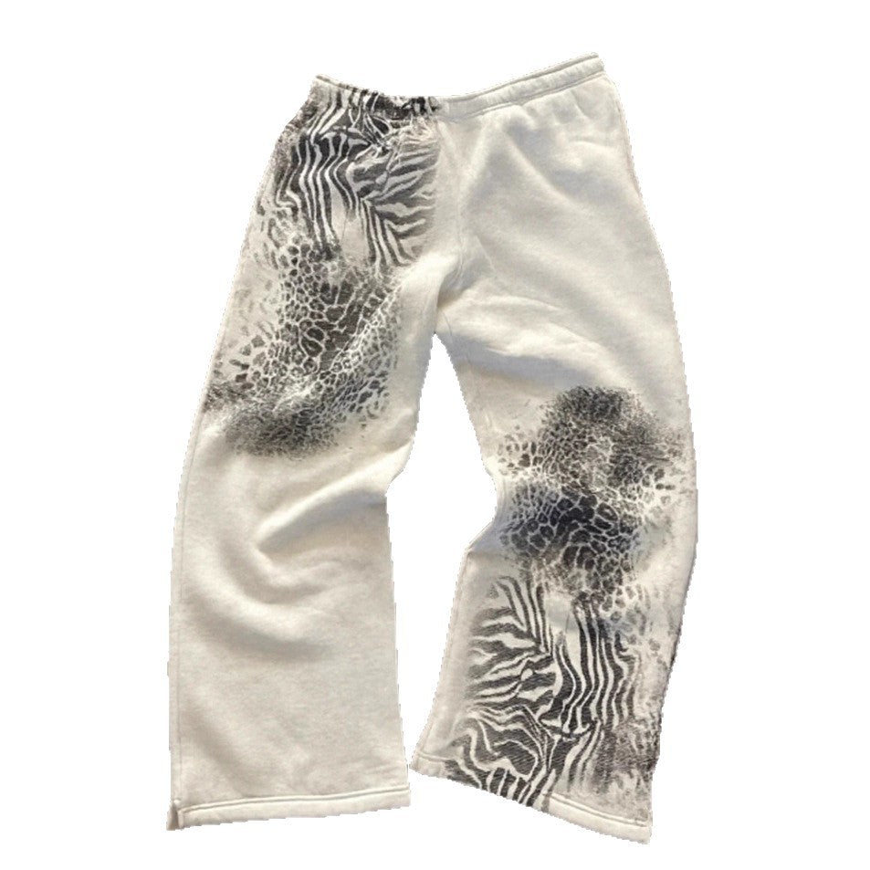 Damen nan lockere Sweathose mit asymmetrischem Animal-Print, elastischem Komfortbund und geradem Bein Echo Archiv