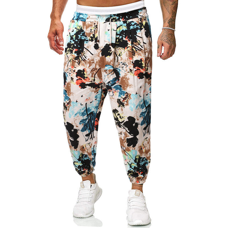 Herren Locker sitzende Patchwork-Loungehose mit Tunnelzug, elastischen Knöcheln und dekorativem Allover-Print Echo Archiv