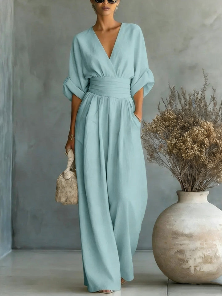 Echoarchiv | Eleganter Ärmelloser Jumpsuit mit Tiefem V-Ausschnitt, Taillenbund und Weitem Bein