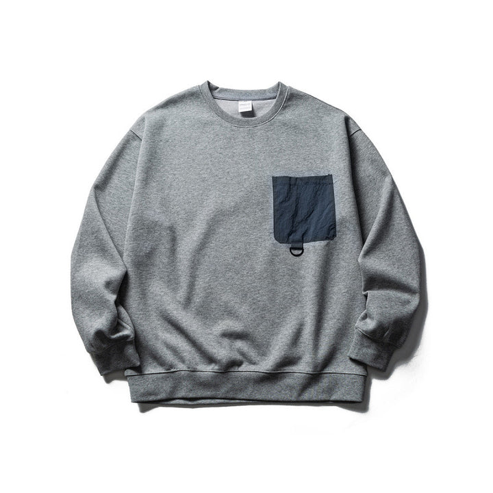 Unisex Oversize-Sweatshirt mit kontrastierender Brusttasche und D-Ring Echo Archiv