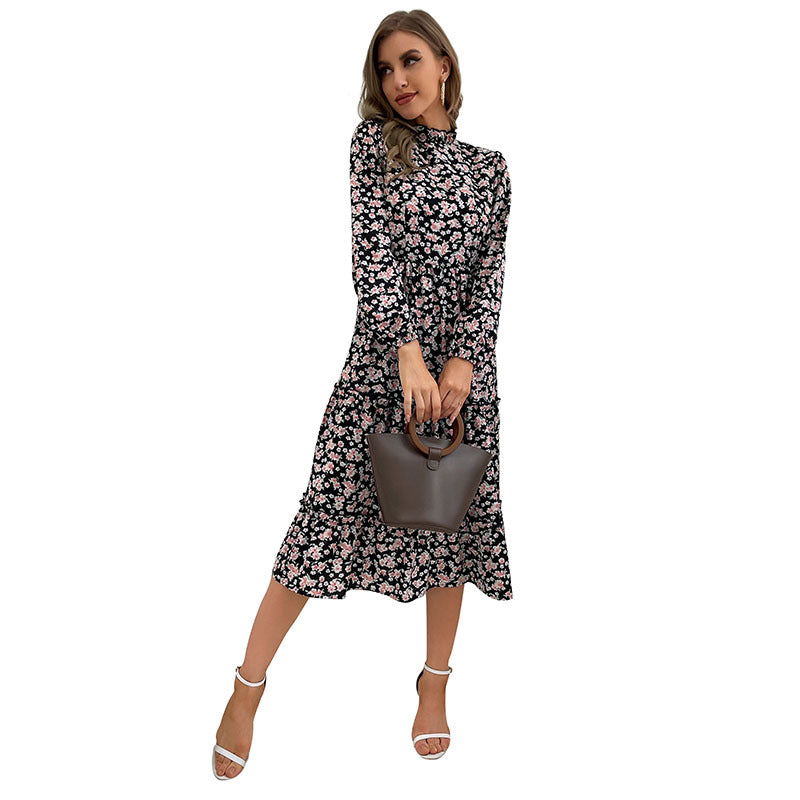 Damen Elegantes Langarm Kleid mit floralem Muster und Rüschendetails Echo Archiv