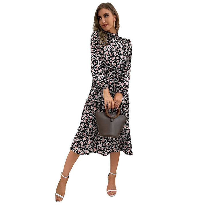 Damen Elegantes Langarm Kleid mit floralem Muster und Rüschendetails Echo Archiv