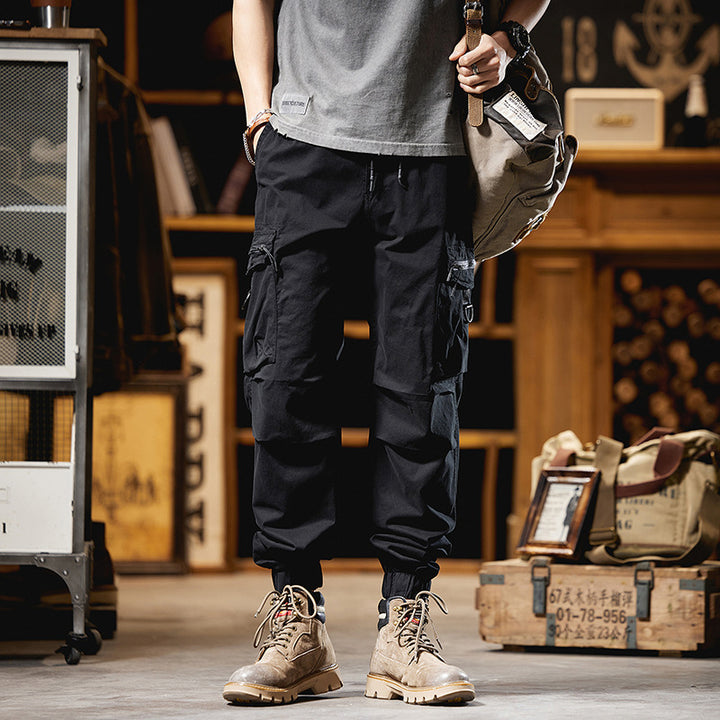 Herren Multifunktionale Cargo-Jogginghose mit D-Ringen, Reißverschluss‑Klappen und elastischen Bündchen Echo Archiv