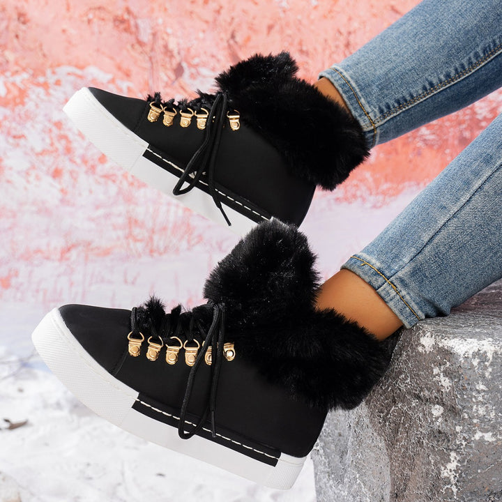 Damen Winterliche Sneaker-Stiefelette mit Kunstfellkragen und Plateau Echoarchiv