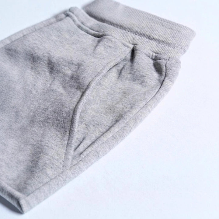 Unisex nan athleisure Jogginghose mit innen angerautem Fleece, elastischem Kordelbund und gerippten Knöchelabschlüssen Echo Archiv