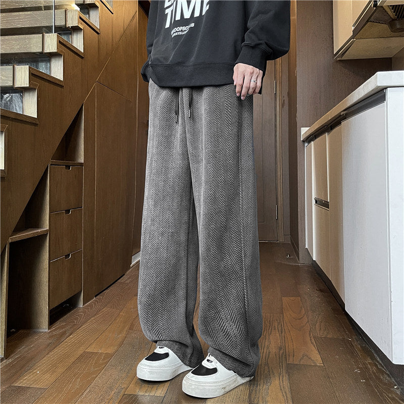 Herren Weit geschnittene Loungehose mit Fischgrätstruktur, elastischem Bund und Tunnelzug Echo Archiv