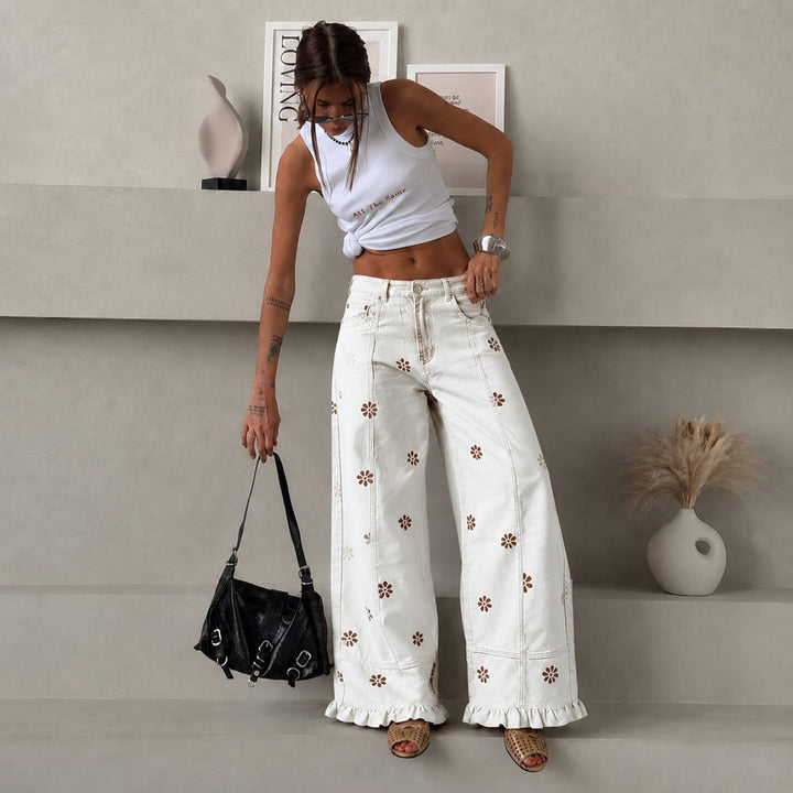 Damen weite Denimhose mit Gänseblümchen-Print, hohem Bund und Rüschenabschluss – Avélisse