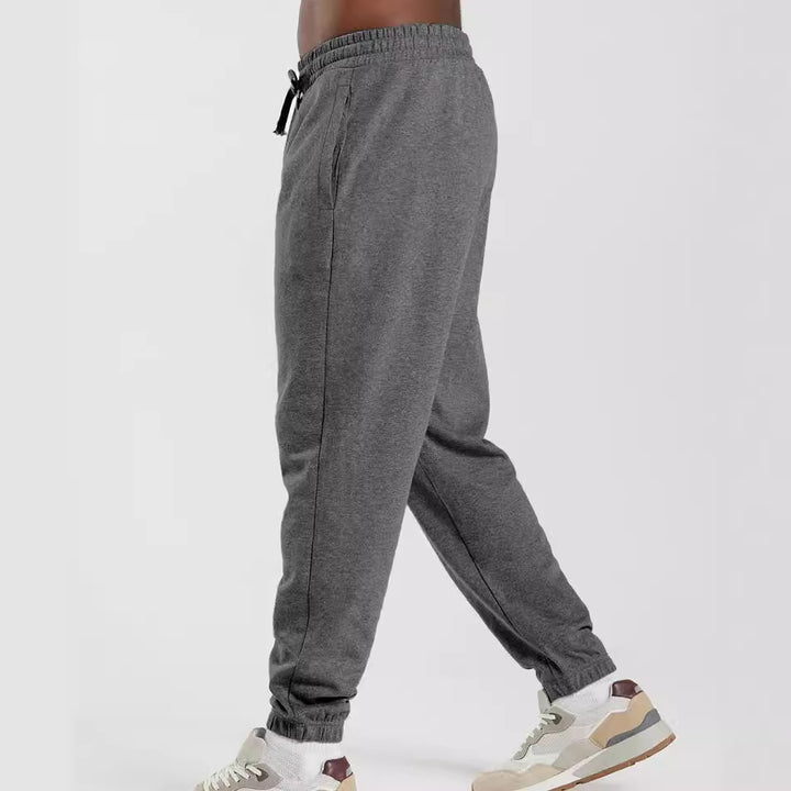 Herren bequeme Jogginghose mit elastischem Bund und seitlichen Taschen Echoarchiv
