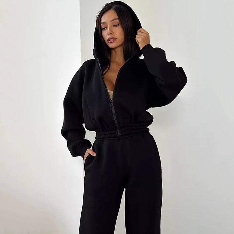 Damen Taillierter Zip-Overall im Loungewear-Stil mit Kapuze, Balloonärmeln und hoher Bundkante – Solévia