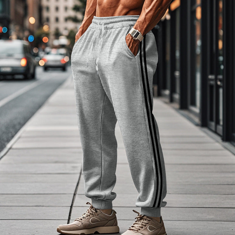 Herren Bequeme Sporthose mit kontrastierenden Seiteneinsätzen und elastischem Bund Echoarchiv