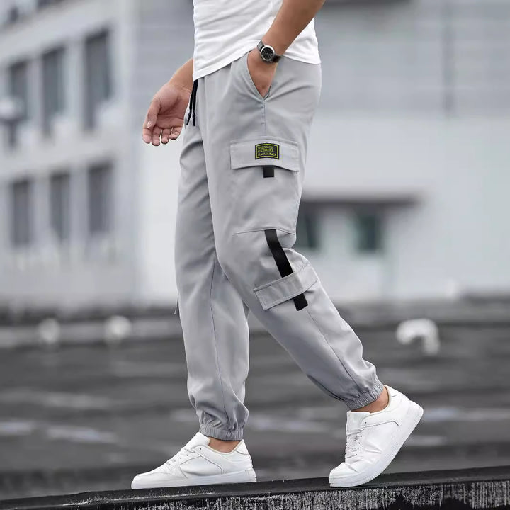 Herren modische Cargo-Joggerhose mit elastischem Bund, Kordelzug und mehreren Sicherheits- und Klappentaschen – Bravaro