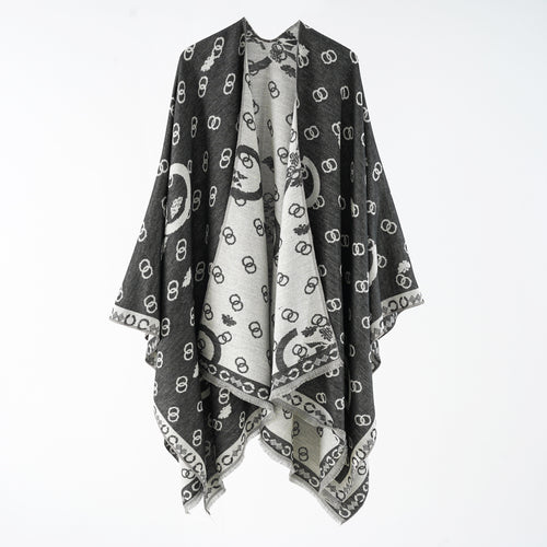 Damen Wendbarer Jacquard-Überwurf mit Fransen und großzügiger Wrap-Silhouette Echo Archiv