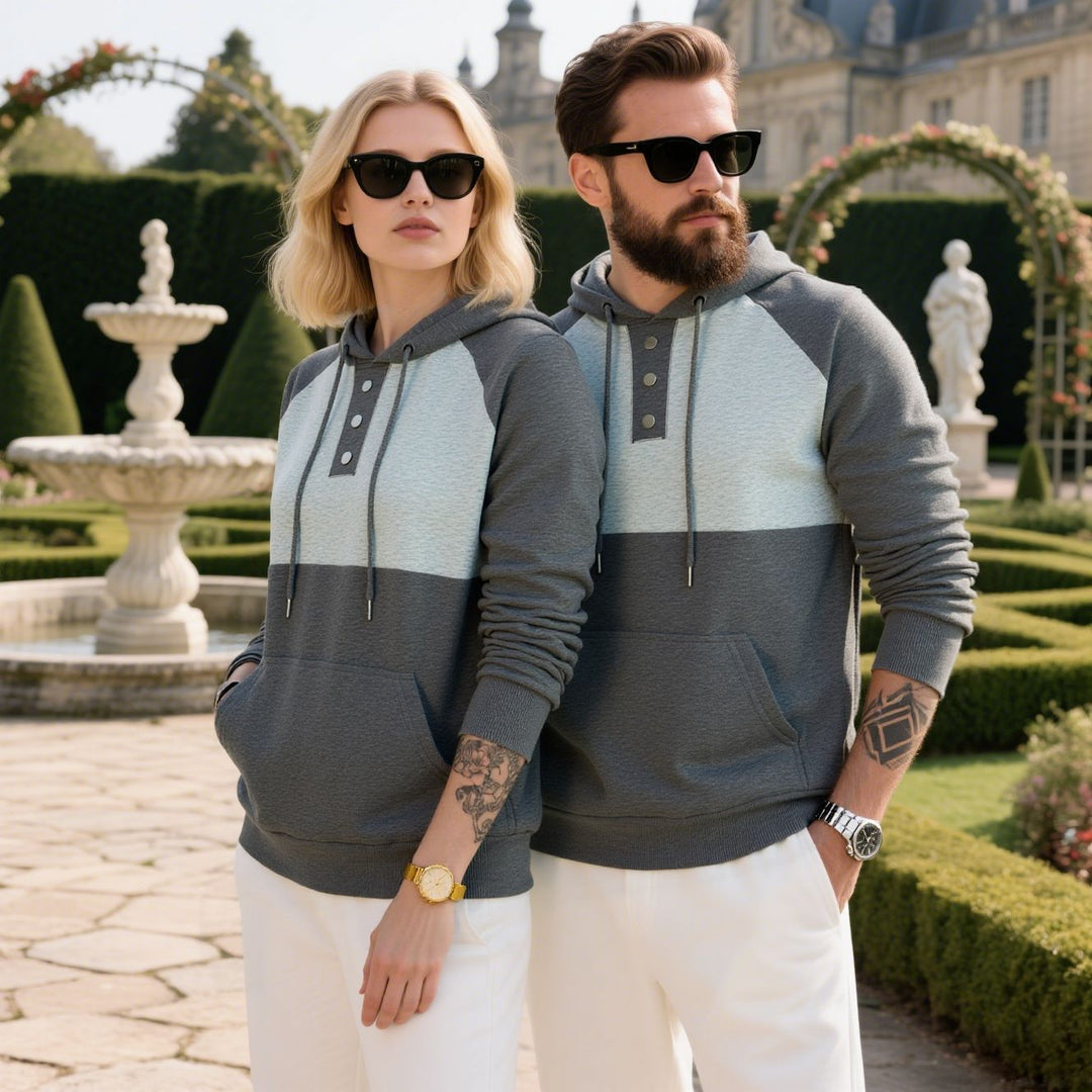 Herren modischer Kapuzenpullover mit strukturiertem Gewebe und praktischen Knopfdetails Echoarchiv